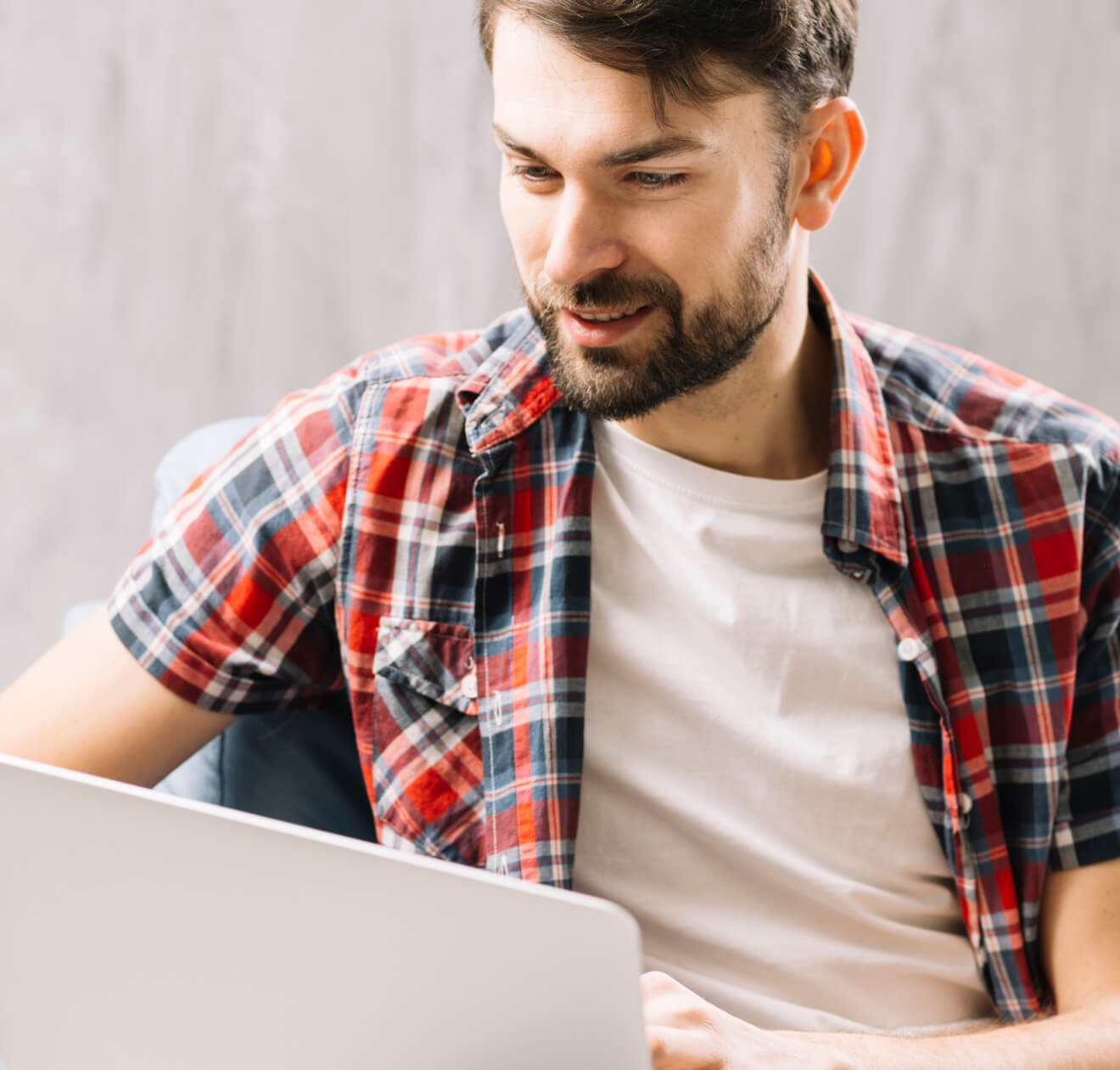 attractive man using laptop